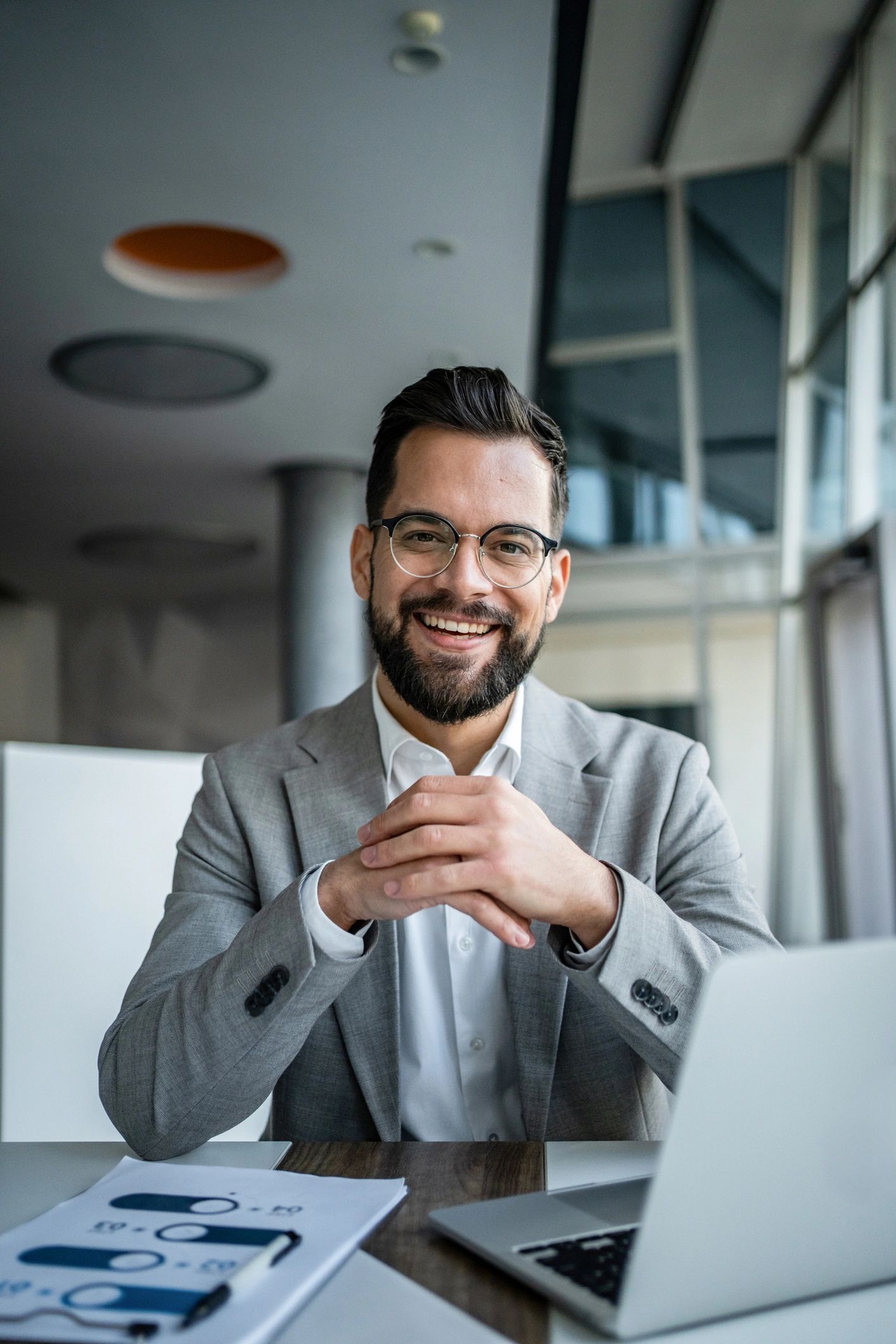 Professional portrait representing client success leadership